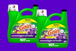 two green bottles of detergent 