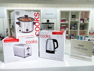 Cooks Small Appliances stacked on a display inside JCPenney.