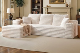 Lifestyle image of a cloud boneless couch in a cream plush corduroy finish