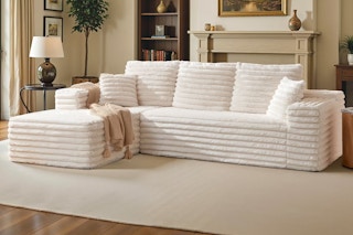 Lifestyle image of a cloud boneless couch in a cream plush corduroy finish