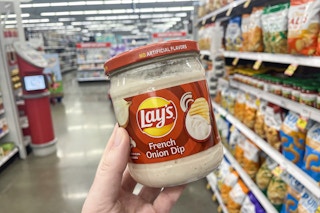 hand holding meijer lay's french onion dip in store