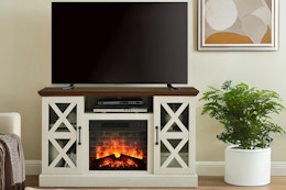 Shoppers Are Freaking Out Over This $98 Fireplace TV Stand at Walmart card image