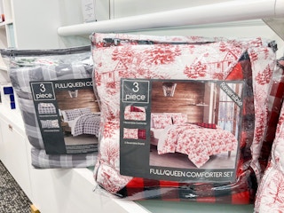 3-piece comforter sets on a shelf in macys