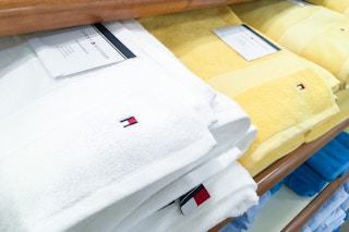 white and yellow tommy hilfiger bath towels