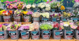 variety of trader joes flowers and bouquets in buckets