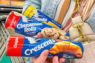 person holding pillsbury products