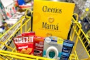 cheerios, suave, folgers, cheez-it, febreze in a yellow shopping cart