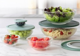 food in mixing bowls on a counter 