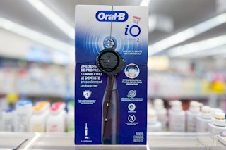 oral-b electric toothbrush on a shelf