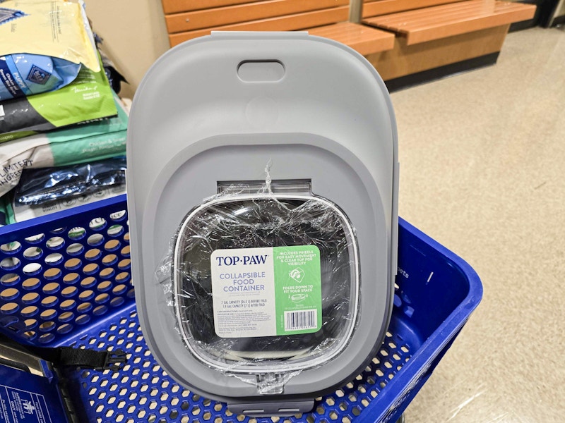 collapsible pet food storage container in a cart