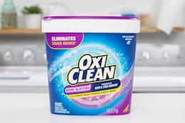 a tub of OxiClean on a counter