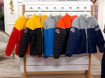 NFL jackets on a rack 