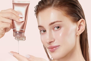 a woman using a medicube mask