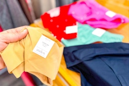 hand holding auden panties at target