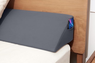 wedge pillow on bed