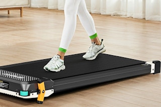 a woman on a walking pad