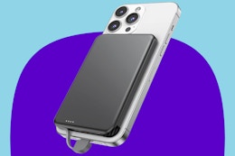 Magsafe phone charger power bank on a purple and blue background.