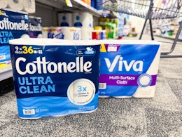 viva paper towels and cottonelle toilet paper in an aisle