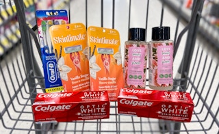 a cart with oral-b toothbrushes, skintimate razors, love beauty and planet hair care, and colgate toothpaste