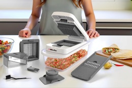 Mueller The Real Original Pro Chopper since 2013 Vegetable Chopper Mandoline Slicer on a kitchen counter.