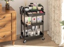 a rolling cart with beauty products in a room