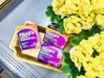 three boxes of allegra allergy relief in tray on walmart shelf