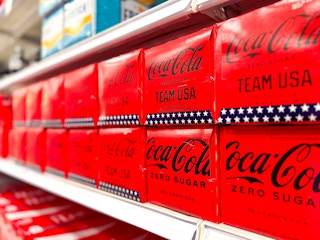coke soda 12-packs sitting on a target shelf