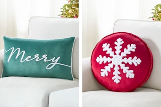 Two Holiday Time decorative pillow options (lifestyle images): Green/White "Merry" & Red/White Snowflake