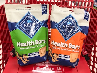 blue health bars dog treats in a target cart