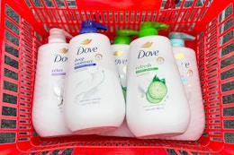 dove body wash pumps in a red shopping basket