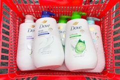 dove body wash pumps in a red shopping basket