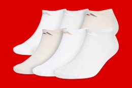 adidas socks on a red background
