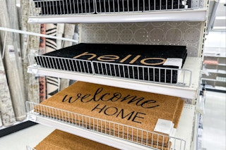 doormats sitting on a target shelf