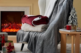 Bedsure Heated Blanket Full Sized, laying on a wingback chair.