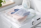 brightroom 3-pack lingerie & garment bags sitting on top of a washer