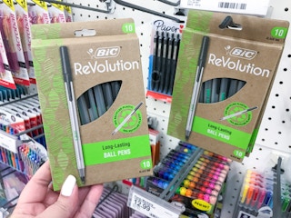 hand holding bic revolution pens at target