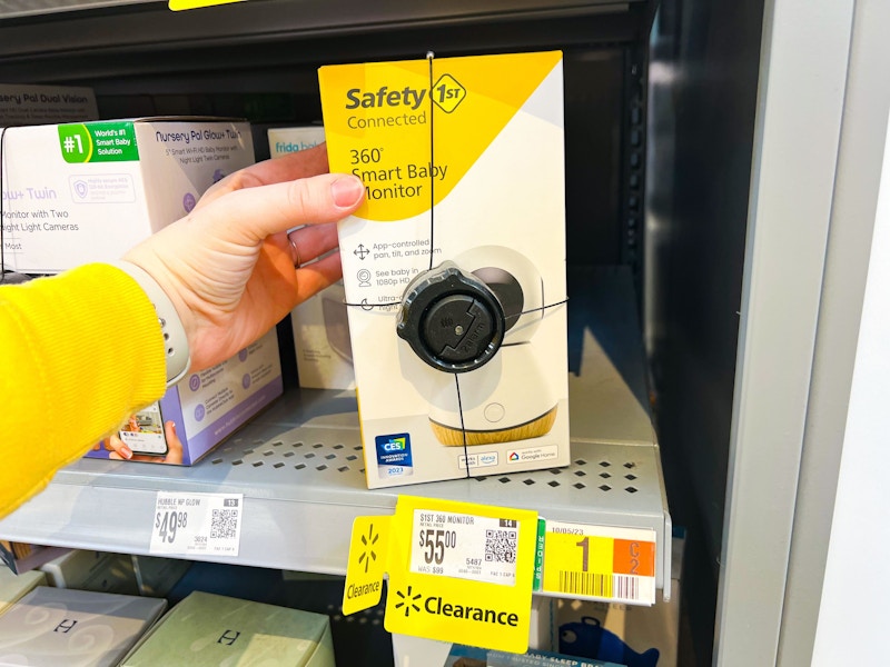 hand holding Safety First Baby Monitor on walmart shelf