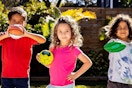 children holding nerf balls