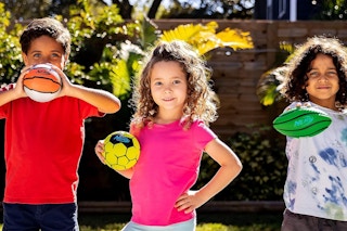 children holding nerf balls