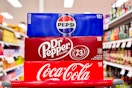 3 soda 12-packs sitting on a target cart