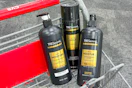 tresemme shampoo, conditioner, and hair spray in a cart