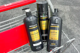 tresemme shampoo, conditioner, and hair spray in a cart