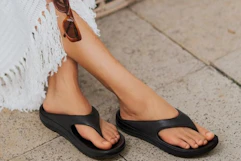 a woman wearing flip flops