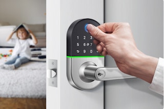 person opening door with their fingerprint