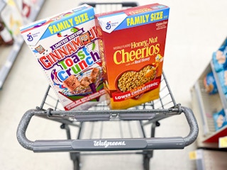 two boxes of family siaze cereal in walgreens shopping cart