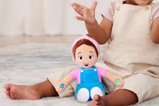 Ms. Rachel Speak & Sing Doll in child's lap