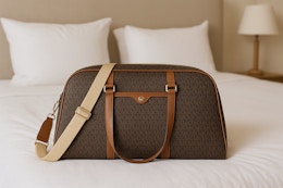 I Saved $579 on This Michael Kors Weekender Bag — It’s Now $119 With Code card image