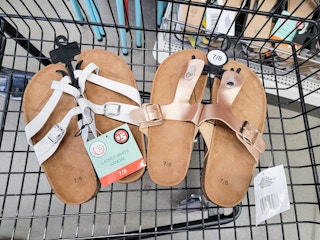 2 pairs of sandals in a cart