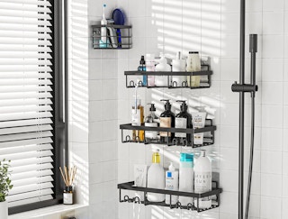 Shower caddy shelves filled with products on a wall