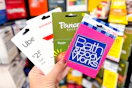 hand holding gift cards doordash panera bread uber bath and body works